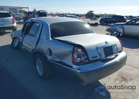 2000 Lincoln Town Car Executive из США, поврежденный, VIN 1LNHM81W7YY820996